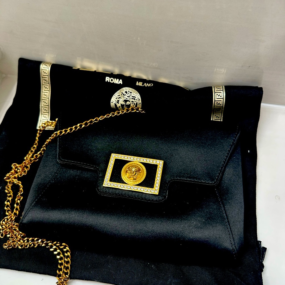 Versace clutch purse Paris